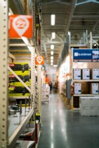 a store aisle filled with lots of yellow and red items